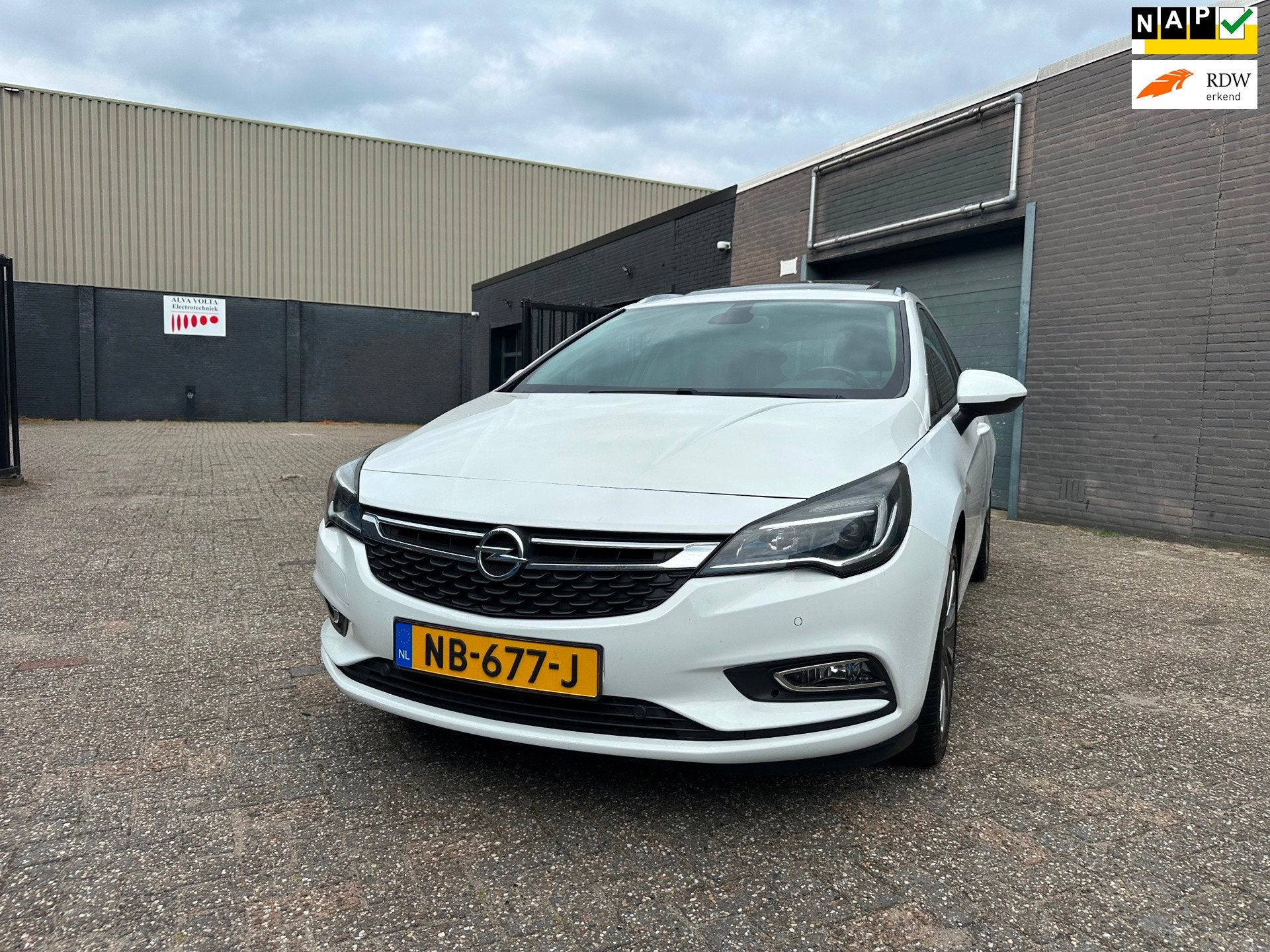 Opel Astra Sports Tourer 1.4 Business+ Clima Cruise Navi Dak, Auto's, Opel, Voorwielaandrijving, Stof, Gebruikt, 4 cilinders