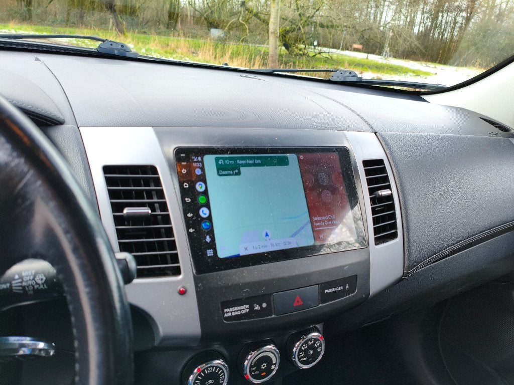 Foto 14 van Mitsubishi Outlander 2.4 125KW 4WD 2010 Wit