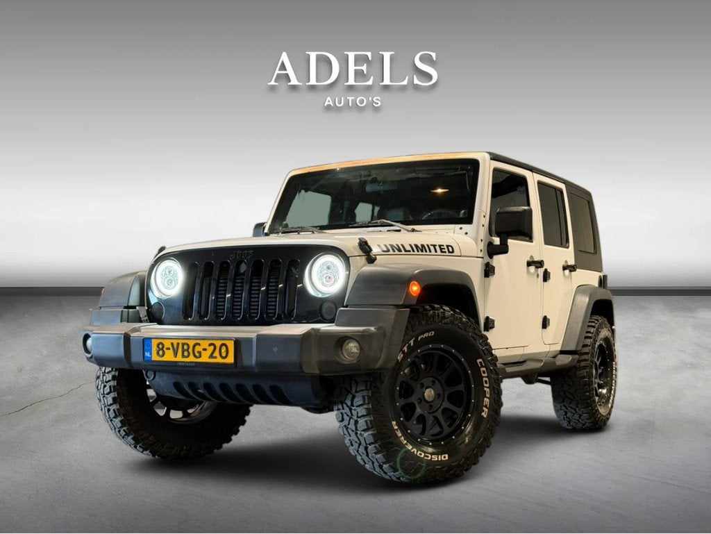 Jeep Wrangler UNLIMITED 2.8CRD L4 AT. AWD LR Automaat Grijsk, Auto's, Bestelauto's, Stof, Gebruikt, Zwart, 4 cilinders