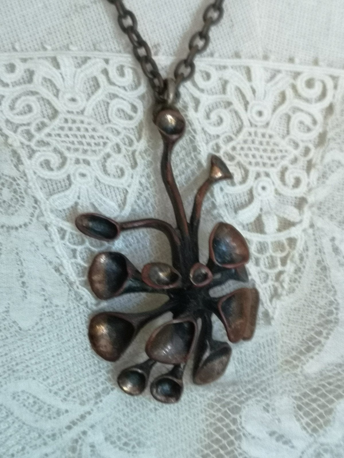 Hanna ikonen bronzen ketting Finland, Ophalen of Verzenden, Gebruikt, Bruin, Overige materialen