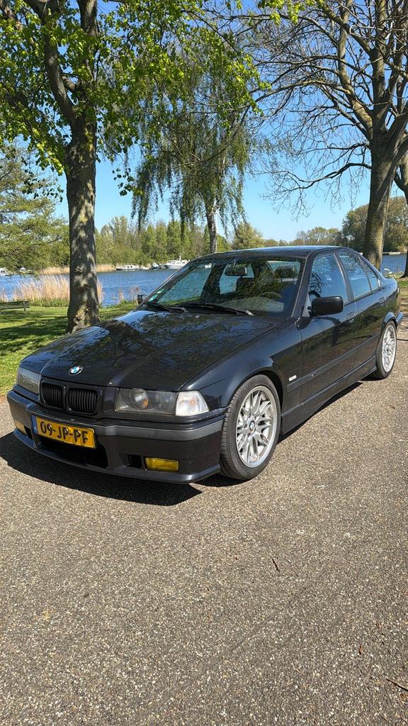 BMW E36 330I M54B30 origineel M pakket, Auto's, Achterwielaandrijving, Zwart, Handgeschakeld, 115 pk