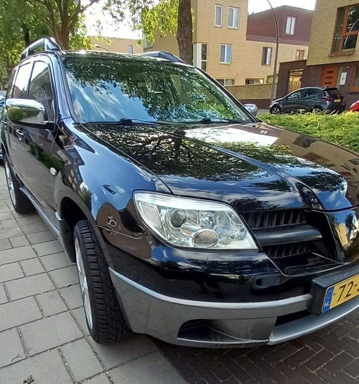 Foto 11 van Mitsubishi Outlander 2.0 MPI 2WD 2006 Zwart