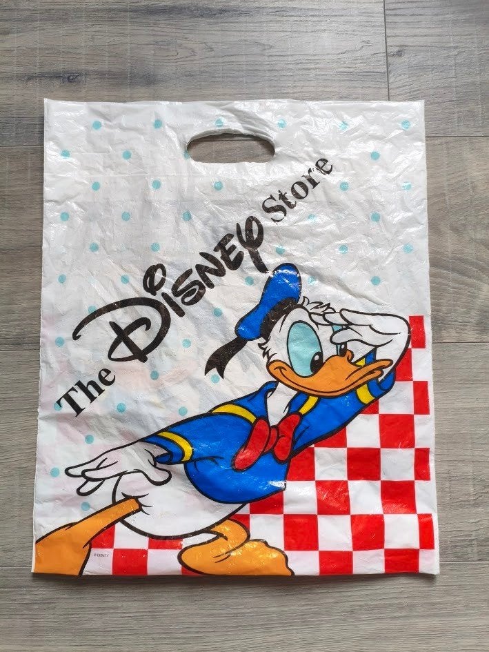 Disney store plastic draagtas ‘’Donald Duck’’ jaren 90, Ophalen of Verzenden, Donald Duck, Gebruikt, Tas, Koffer of Zak