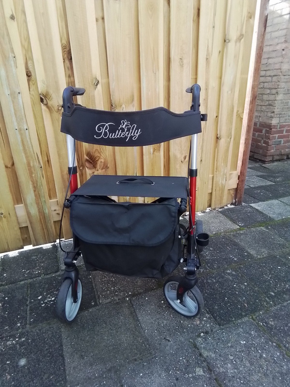 een goed  werkende rollator Ferrari  rood  merk butterfly, Ophalen of Verzenden, Opvouwbaar, Gebruikt