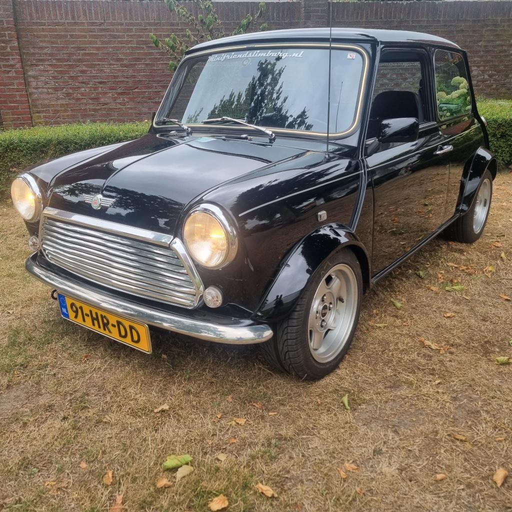 Rover Mini 1.3 I Cooper 1994 Zwart, Auto's, Voorwielaandrijving, Overige modellen, 4 cilinders, Leder en Stof