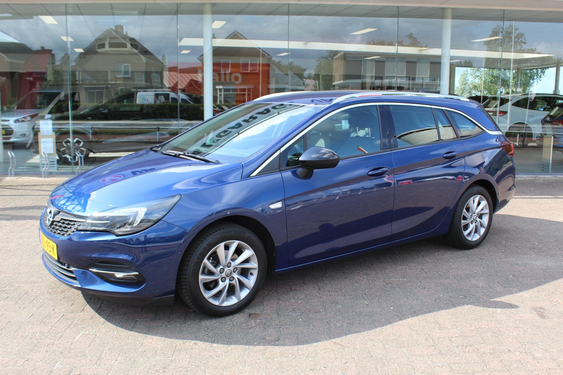 Opel Astra Sports Tourer 1.2 110pk Elegance Climate control, Auto's, 12 maanden, Stof, Gebruikt, Zwart