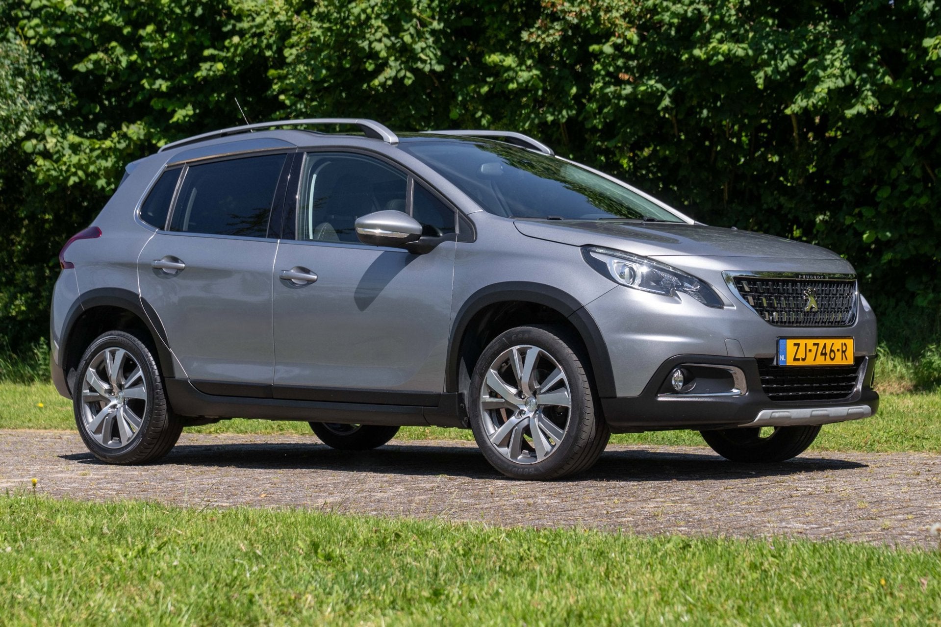 Peugeot 2008 1.2 PureTech Allure Pano. 48.600 km +NAP NL-aut, Auto's, Dealer onderhouden, Euro 6, 1199 cc, Leder en Stof