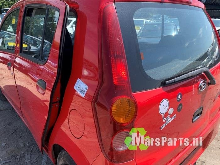 Achterlicht links van een Daihatsu Cuore, Gebruikt, Daihatsu, -, -