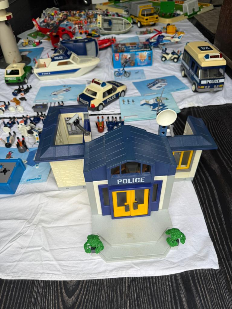 Twee dozen vol playmobil, Ophalen