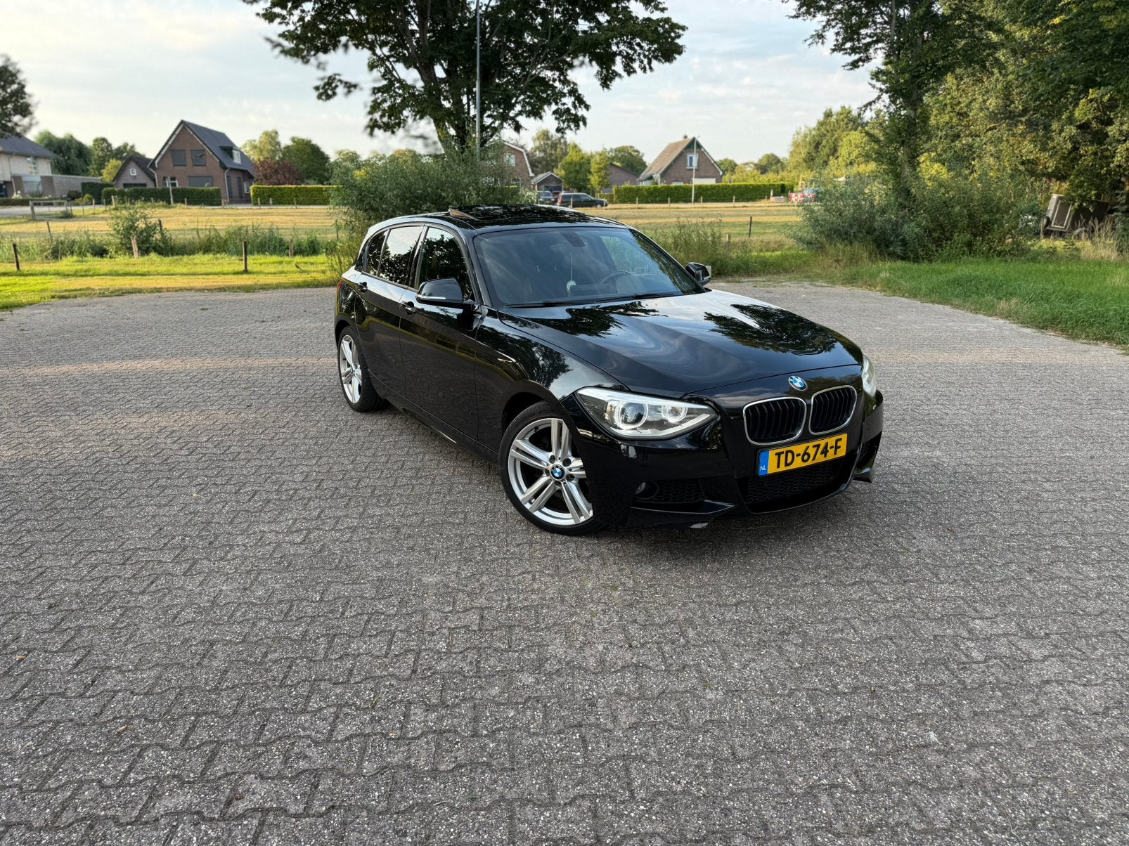 BMW 1-Serie 2.0 118D 5DR AUT 2012 Zwart M pakket, Auto's, Achterwielaandrijving, 1995 cc, Zwart, 1200 kg