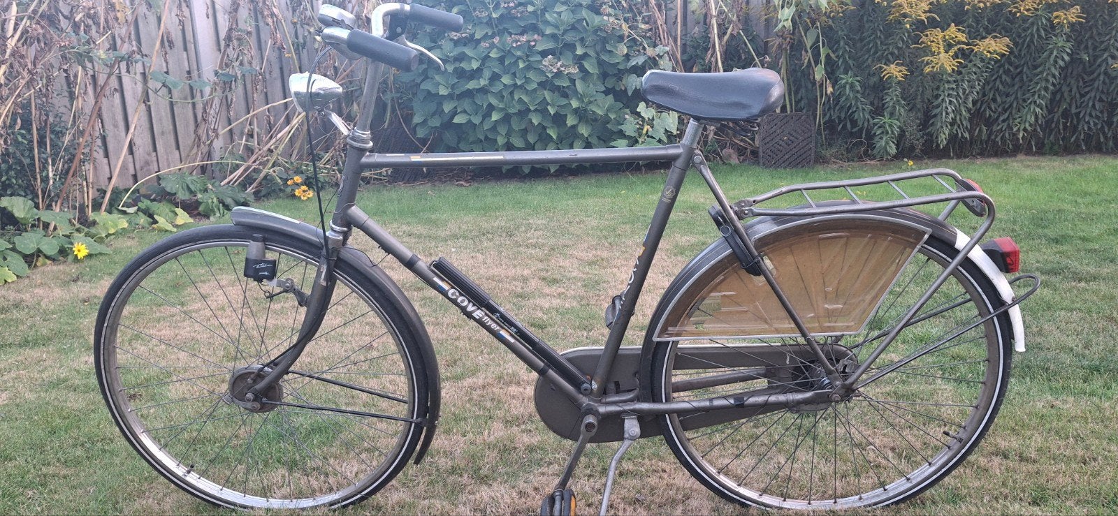 Goed onderhouden herenfiets, Ophalen