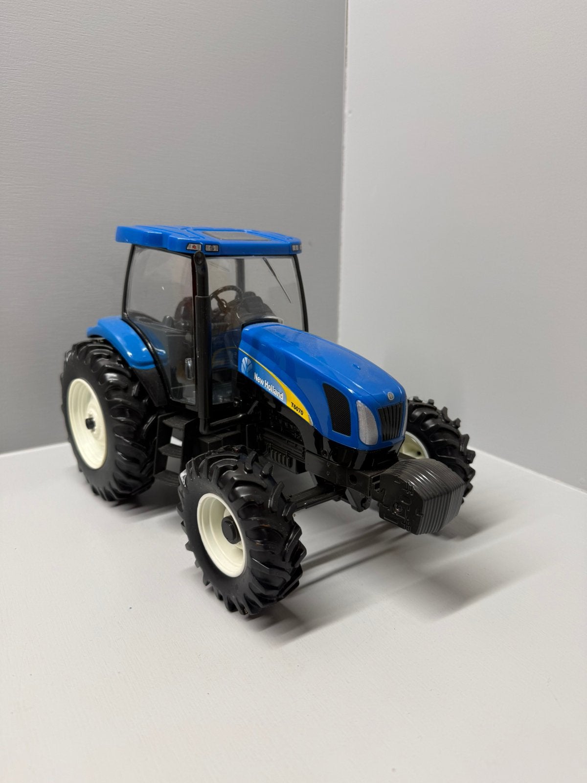 Ertl new holland T6070, Hobby en Vrije tijd, Ophalen of Verzenden, Zo goed als nieuw, Tractor of Landbouw, ERTL