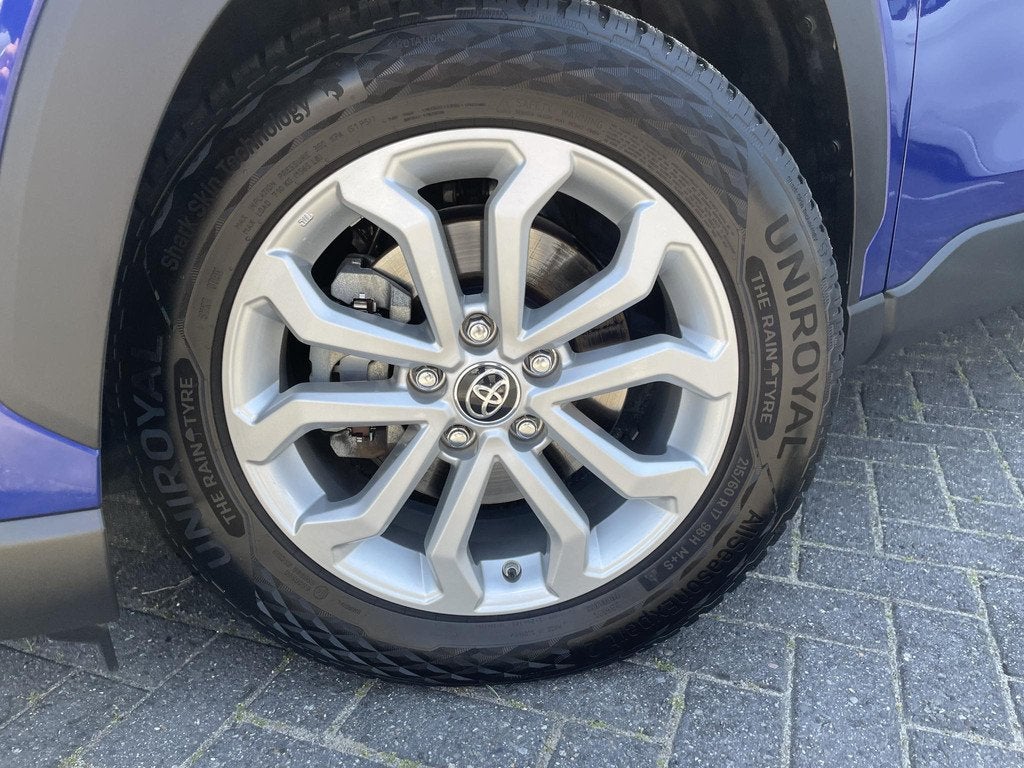 Toyota Corolla Cross Hybrid 140 Business | Parkeersensoren V, Auto's, Stof, Blauw, Bedrijf, Hybride Elektrisch/Benzine