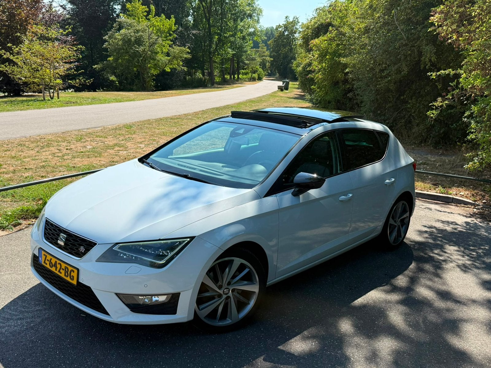 Seat Leon 1.8 TSI 132KW/180PK Dsg-7 2013 Wit, Auto's, Seat, Particulier, Leon, ABS, Airbags, Airconditioning, Automatische klimaatregeling