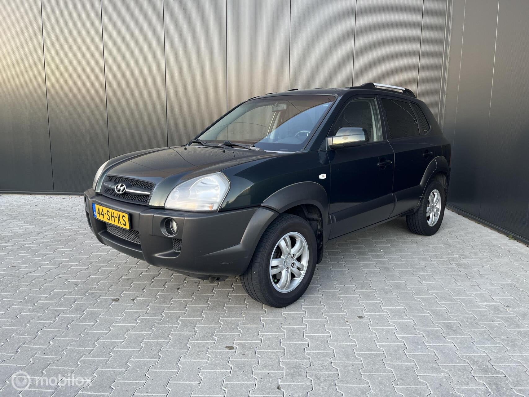 Hyundai Tucson 2.0i Style / AIRCO / CRUISE / TREKHAAK, Auto's, Gebruikt, 4 cilinders, Bedrijf, Handgeschakeld