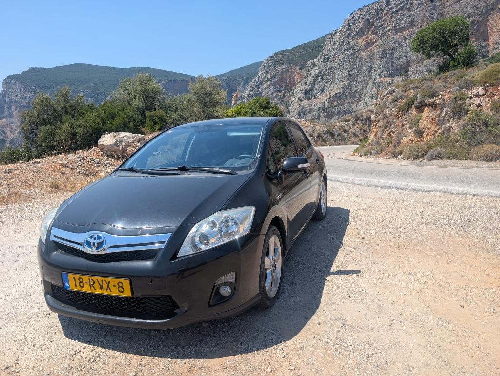 Toyota Auris 1.8 Full Hybrid 5DR CVT 2011 Zwart, Auto's, Zwart, 4 cilinders, Zwart, Origineel Nederlands