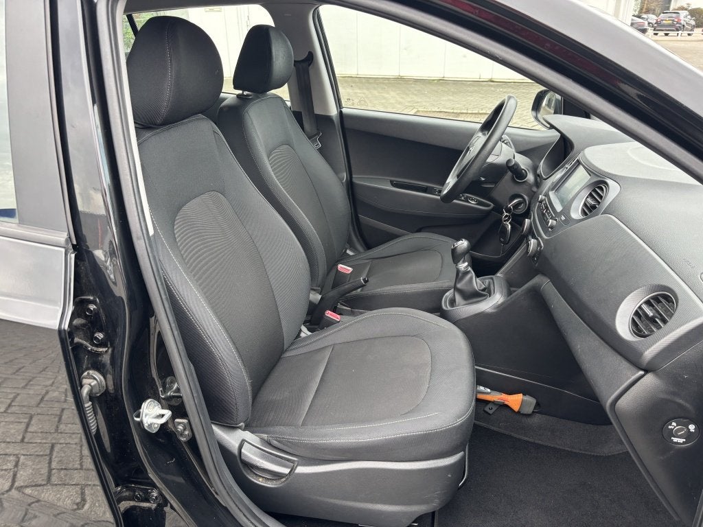 Hyundai i10 1.0i Go! Carplay Cruise Airco Navi Bluetooth, Voorwielaandrijving, Stof, Gebruikt, 4 stoelen