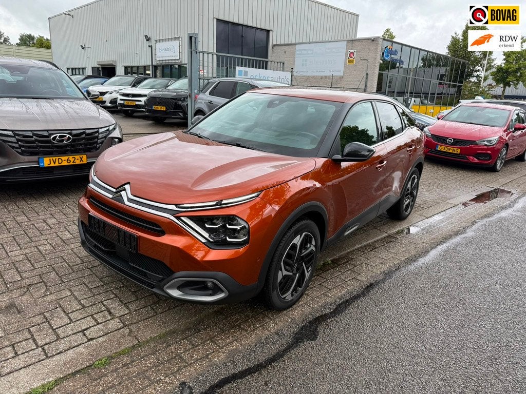 Citroen C4 1.2 PureTech Shine Automaat, Navi, Leder Dealer a, Gebruikt, Leder en Stof, Grijs, 3 cilinders