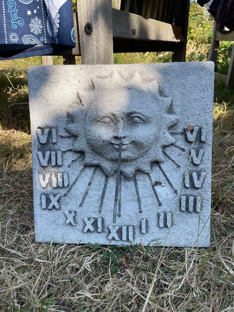 Zonnewijzer tuin beeld, Ophalen