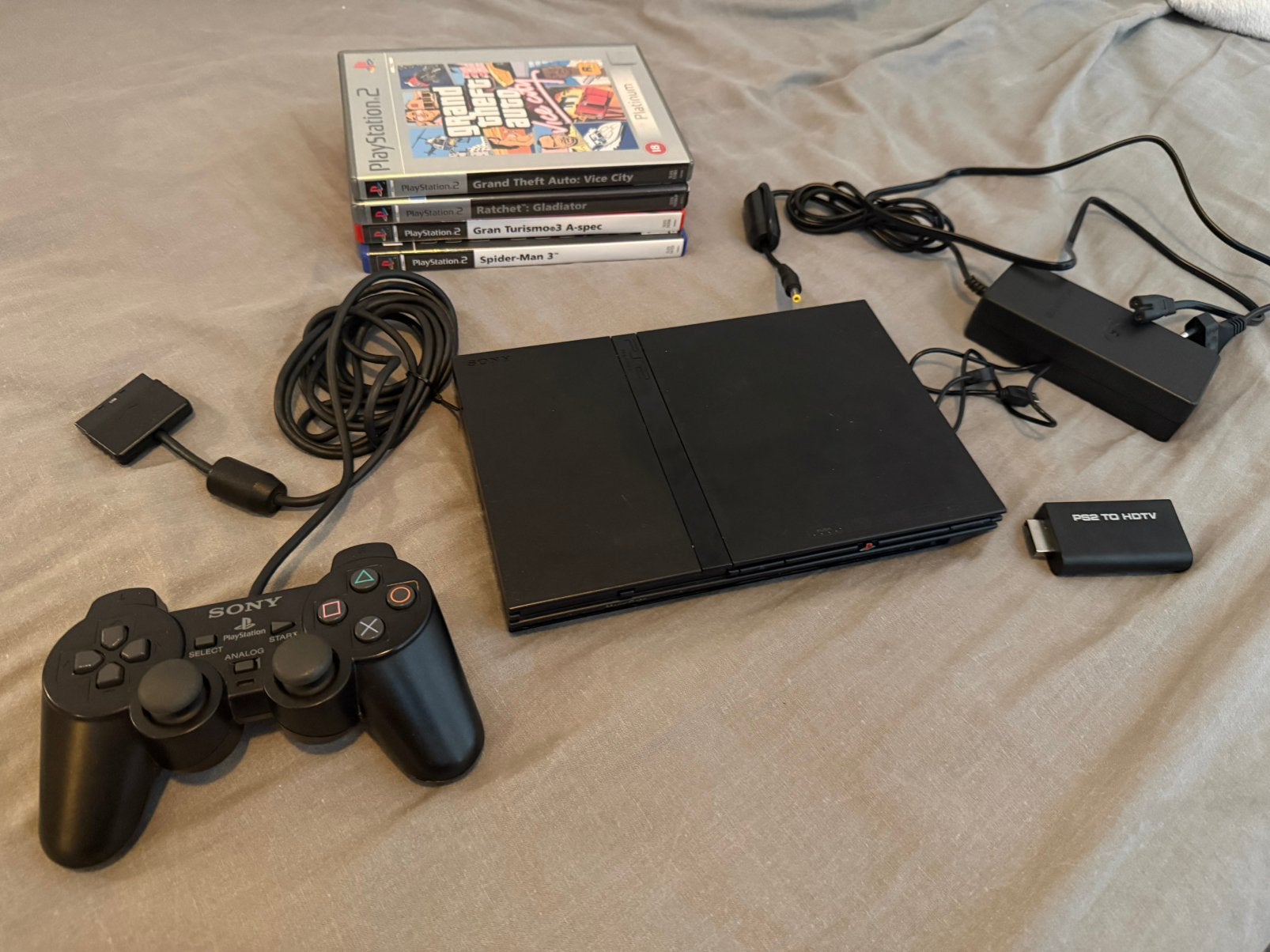 Ps2 slim met joystick en 4 games, Spelcomputers en Games, Overige genres, 1 speler, Ophalen of Verzenden, Zo goed als nieuw