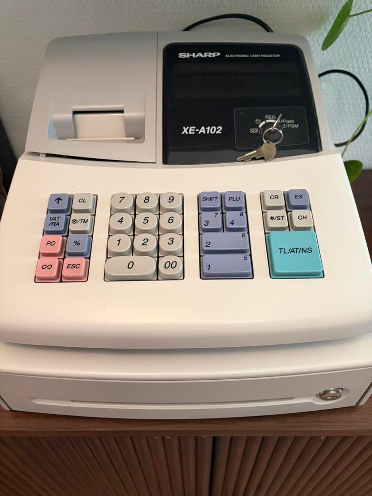 Kassa Sharp XE a102 met boekjes, Ophalen