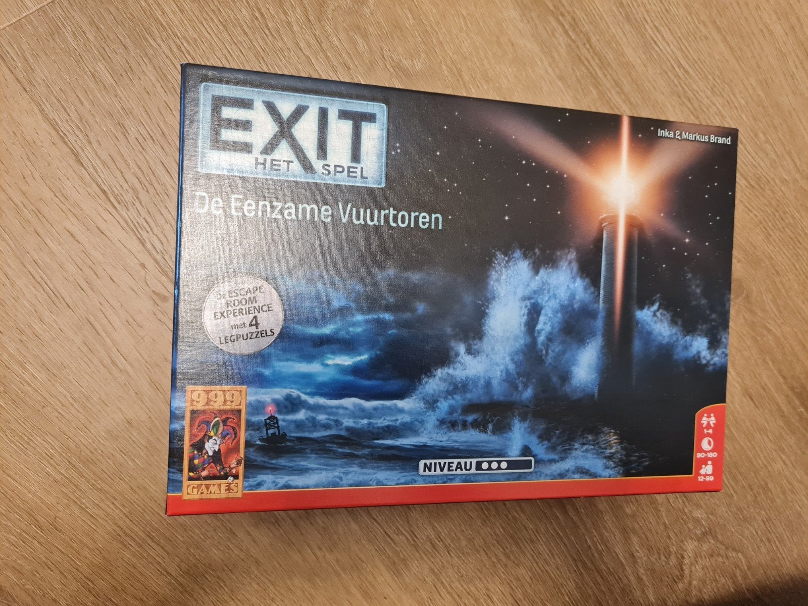 EXIT Het Spel: De Eenzame Vuurtoren (met puzzels), Een of twee spelers, Ophalen of Verzenden, Zo goed als nieuw, 999 Games