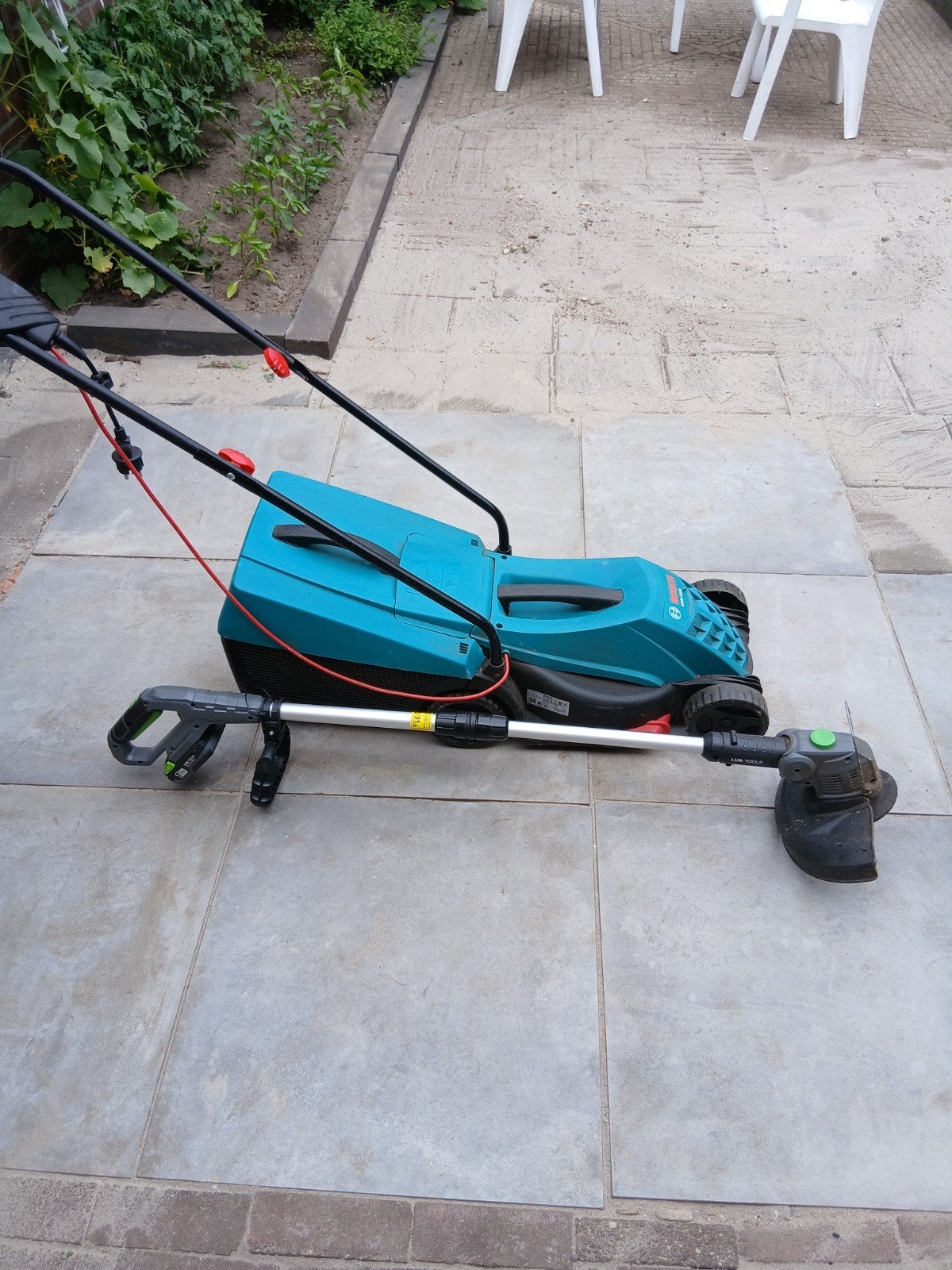 Bosch elektrische grasmaaier en trimmer set, Ophalen of Verzenden, Gebruikt, Elektrische grasmaaier, Bosch