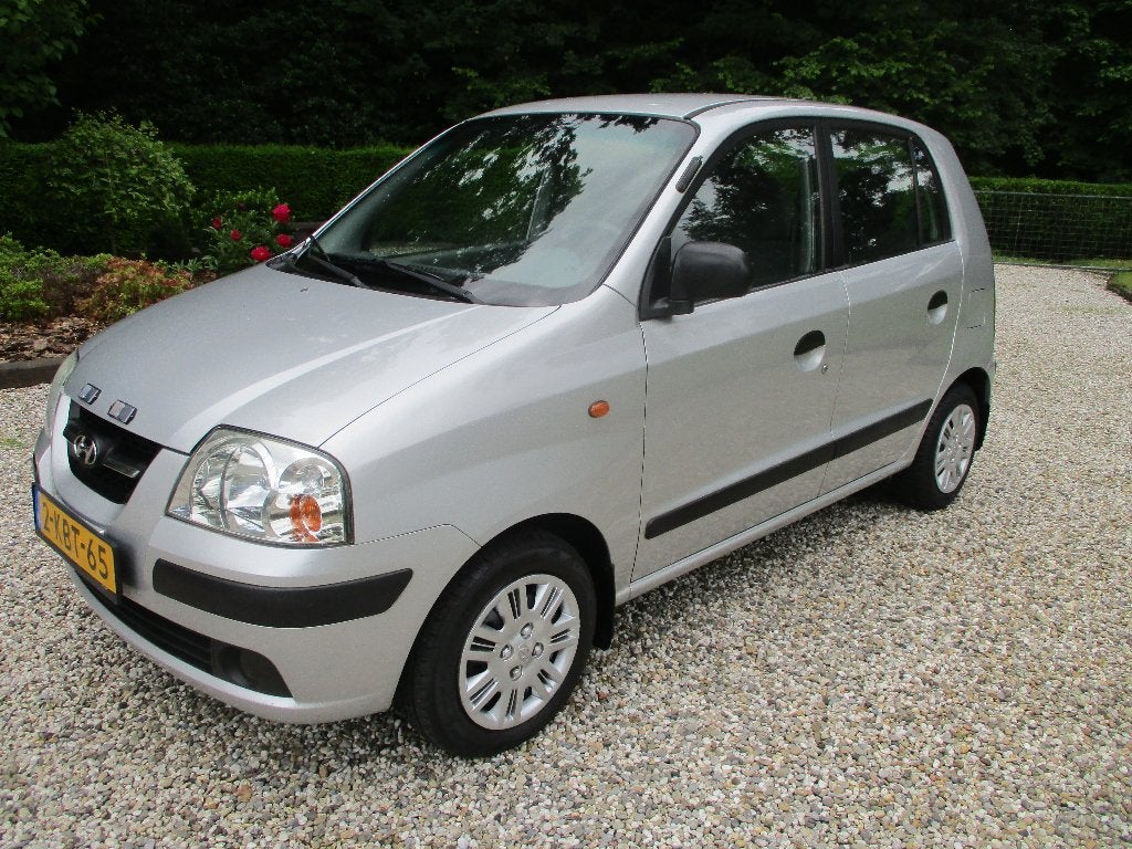 hyundai atos 1.1 stuurb. abs airco c.v, Auto's, Hyundai, 46 pk, 400 kg, Leder en Stof, Grijs