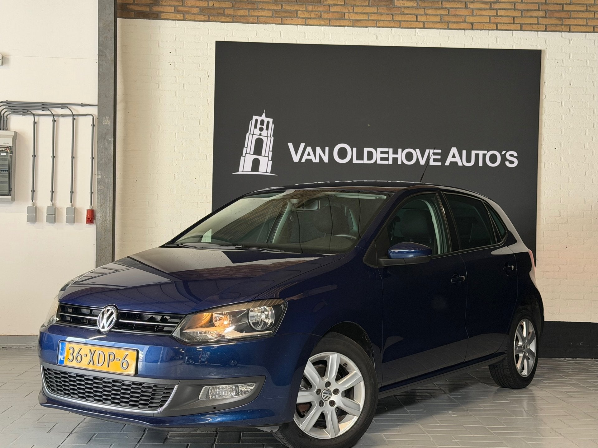 Volkswagen Polo 1.2 TSI BlueMotion Highline NAP | Navi | Cru, Auto's, Voorwielaandrijving, Euro 5, Stof, Zwart