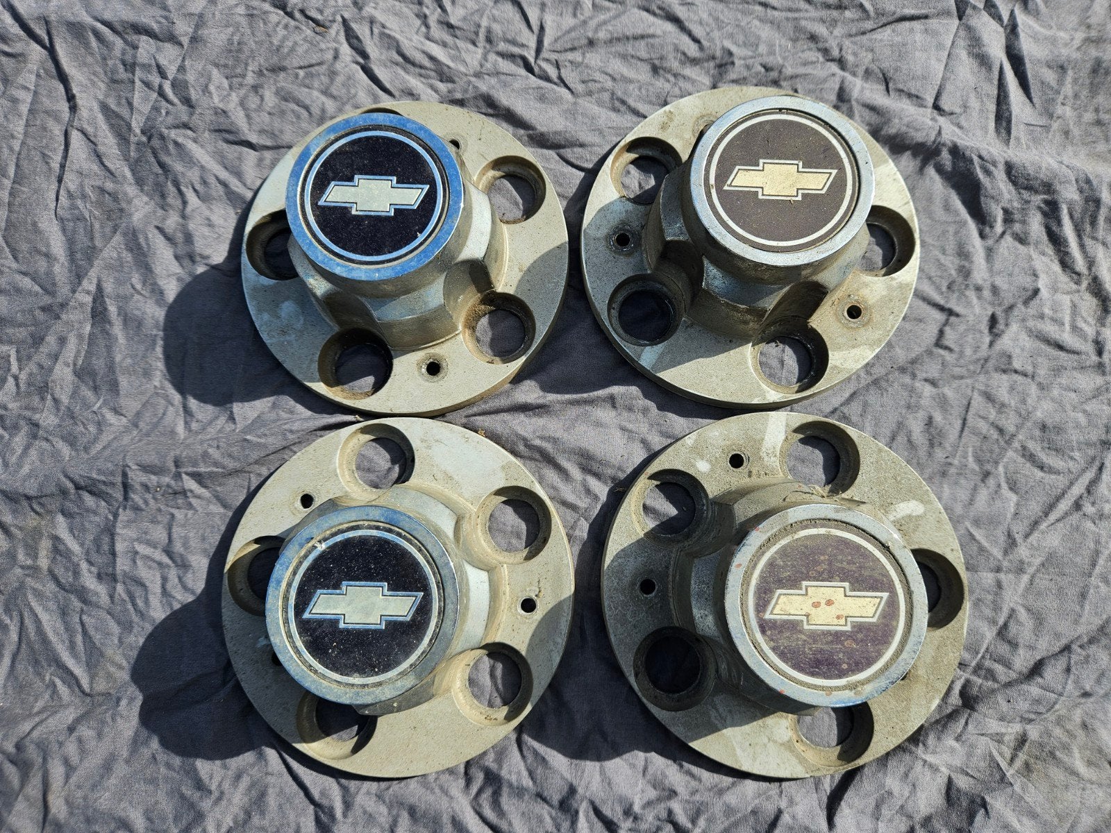 Set van 4 Chevrolet wieldoppen - Gebruikt, Auto diversen, Wieldoppen, Ophalen of Verzenden, Gebruikt