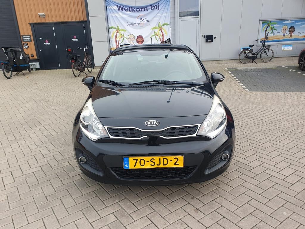 Kia Rio 1.2 CVVT Superpack Achtuitcamera/Carplay, Navigatiesysteem, Zwart, Handgeschakeld, Particulier