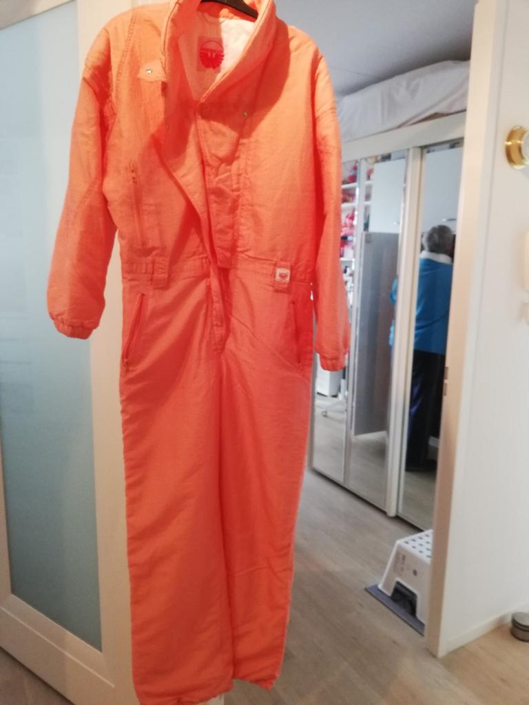 Mooie oranje skioverall, Sport en Fitness, Skiën en Langlaufen, Overige merken, 160 tot 180 cm, Ophalen of Verzenden, Zo goed als nieuw