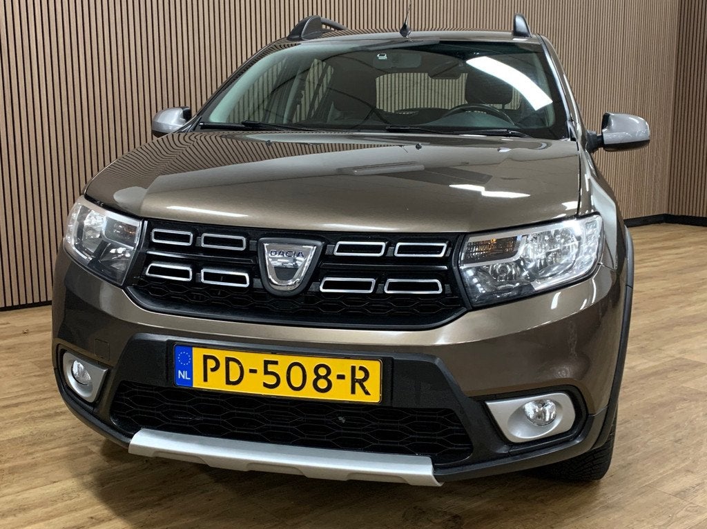 Dacia Sandero 0.9 TCe SL Stepway|Navigatie|133000KM|Airco|, Auto's, Voorwielaandrijving, 898 cc, Stof, Bruin