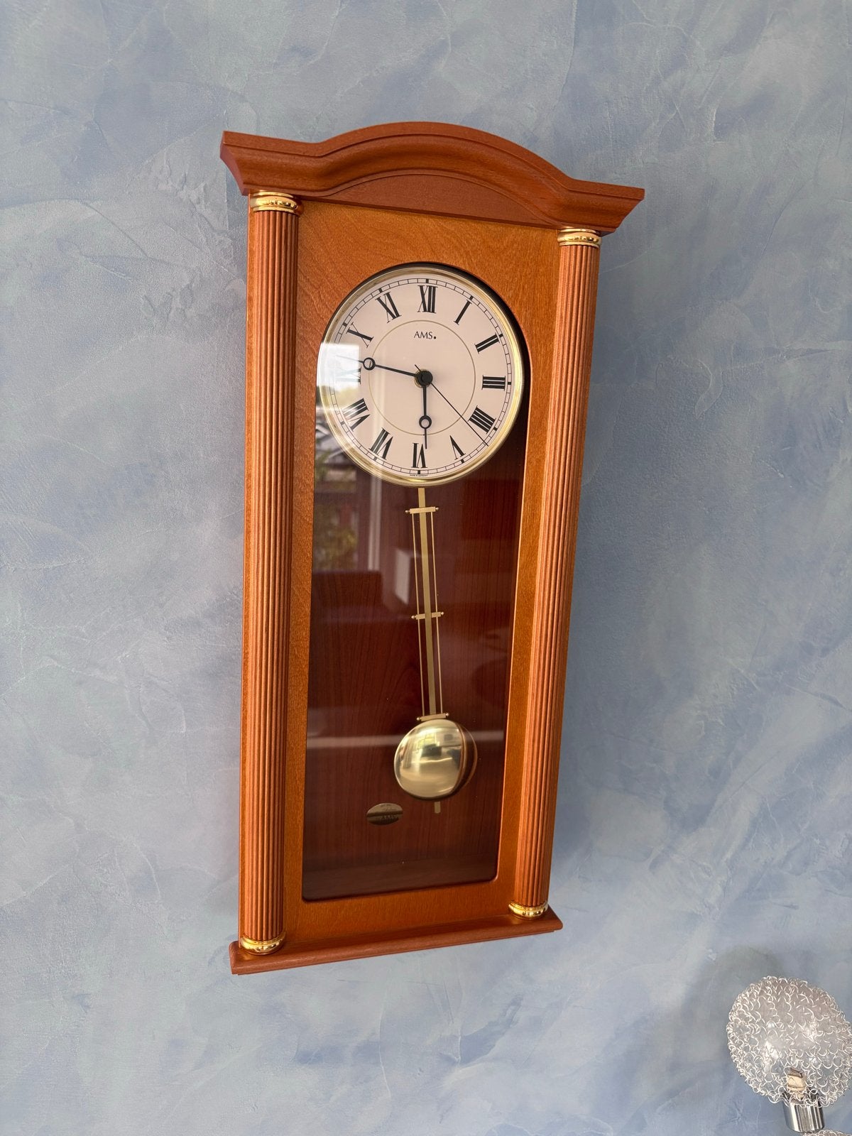Klassieke AMS wandklok met slinger, Ophalen