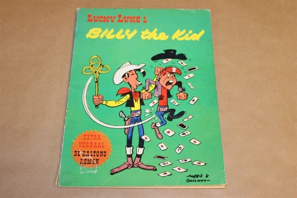 Lucky Luke & Billy the Kid - Reclame-uitg Koopmans 1968, Eén stripboek, Ophalen of Verzenden, Gelezen