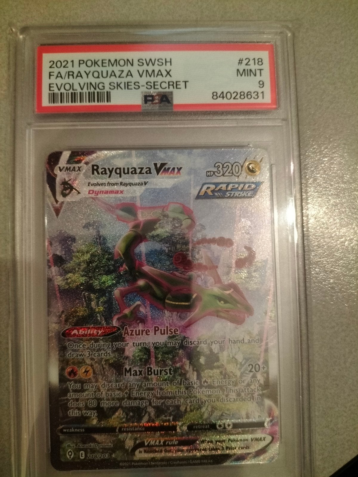 Rayquaza VMAX Evolving Skies Secret Rare PSA 9, Ophalen of Verzenden, Zo goed als nieuw, Losse kaart, Foil