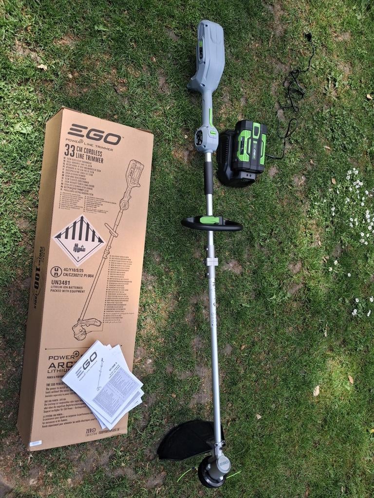 EGO 33 cm Accugrastrimmer met Accu en Oplader, Tuin en Terras, Grasmaaiers, Accu-grasmaaier, Ophalen of Verzenden, 30 t/m 39 cm