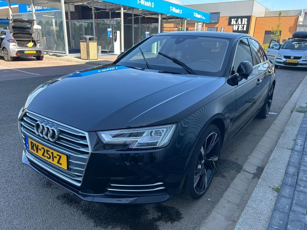 Audi A4 1.4 tfsi, s tronic,zwart.APK februari 2027., Auto's, Automaat, Stof, A4, Zwart