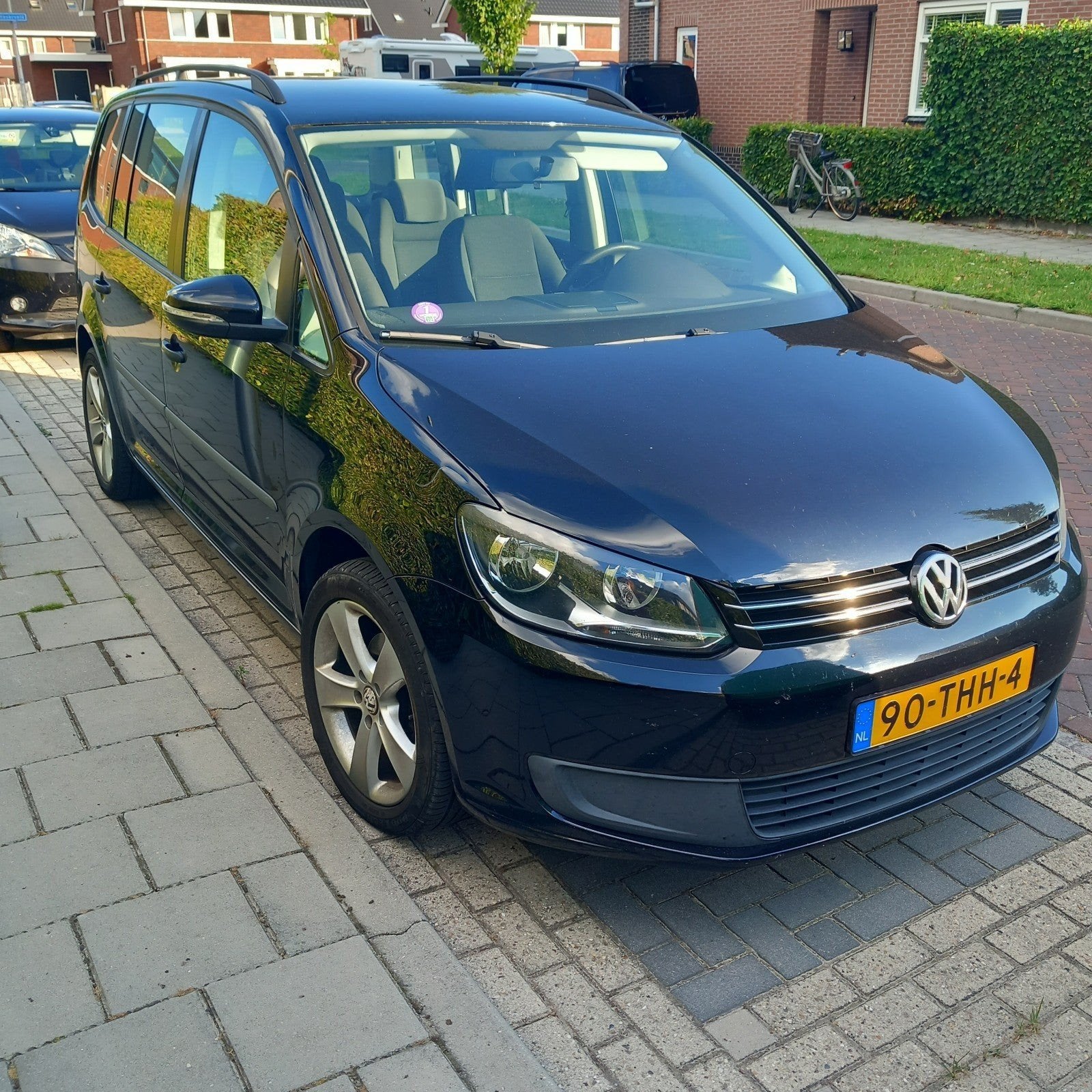 Volkswagen Touran 1.2 TSI 77KW BMT 7P 2012 Zwart, Auto's, Volkswagen, Voorwielaandrijving, 4 cilinders, 7 stoelen, Zwart