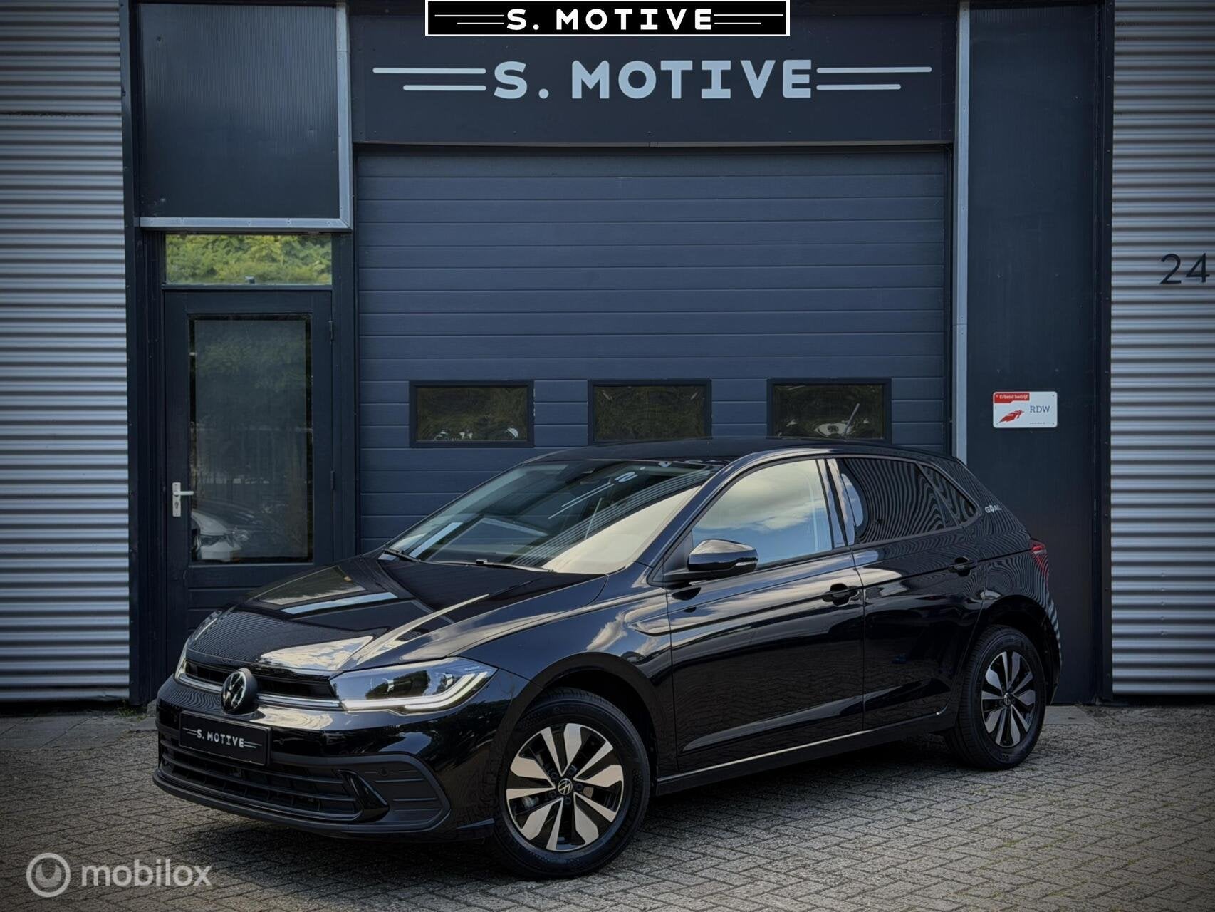 Volkswagen Polo 1.0 TSI Goal Trekhaak, BTW, Stoelverw, Camer, Auto's, Voorwielaandrijving, Gebruikt, Zwart, 95 pk