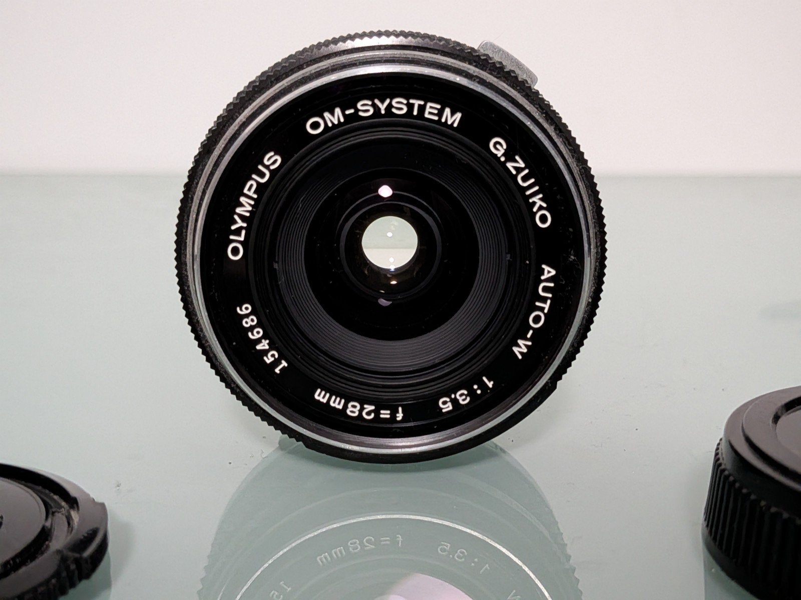 Olympus OM G.zuiko Auto-W 3.5 28mm lens, Ophalen of Verzenden, Gebruikt, Olympus