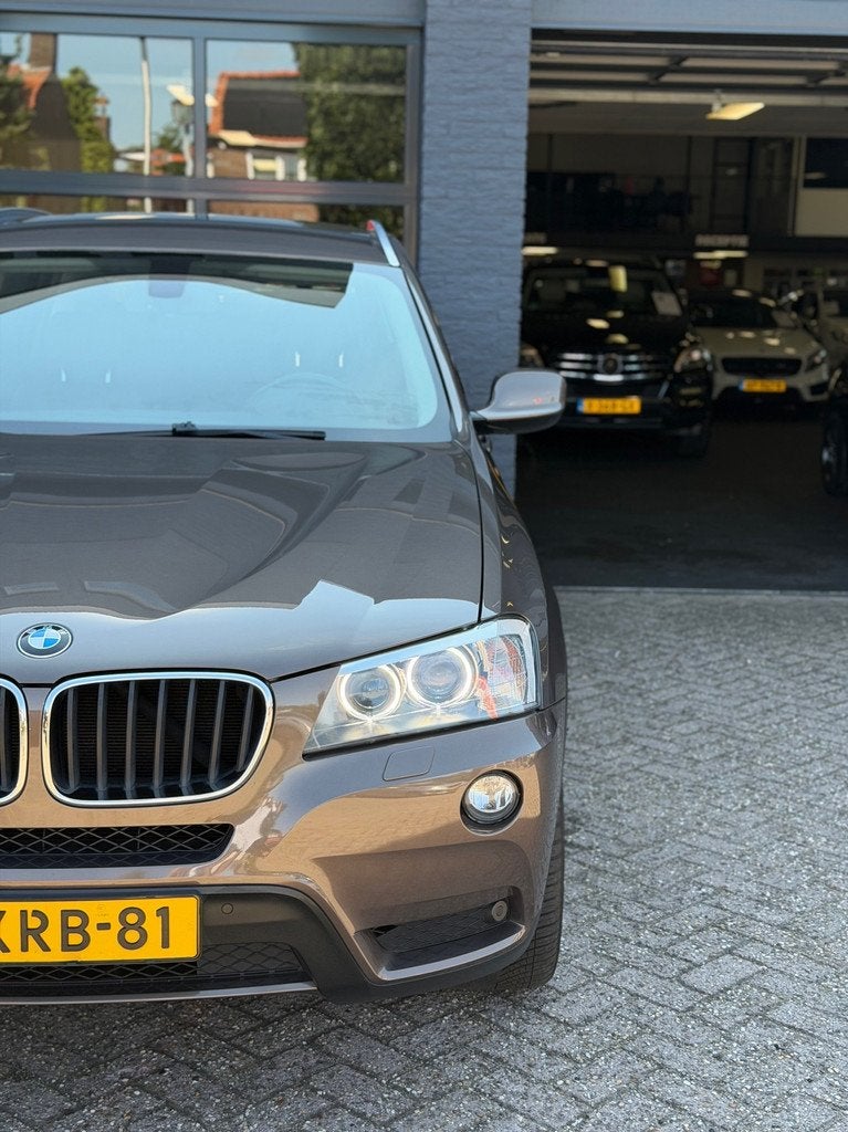 BMW X3 XDrive20i High Executive MPakket|Leer|Xenon|Pdc|Nap, Auto's, Euro 5, Gebruikt, 4 cilinders, Bruin