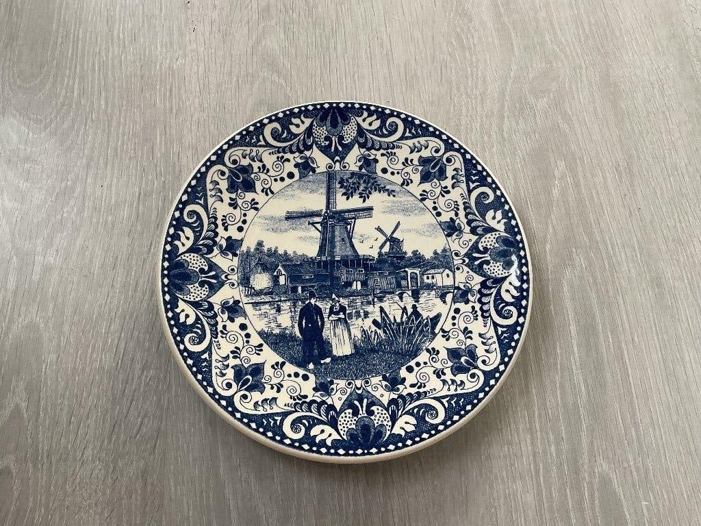 Delfts blauw bord, Ophalen