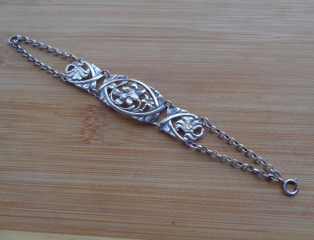 zilveren armband met bloemen schildjes [650], Verzenden, Zo goed als nieuw, Zilver, Zilver