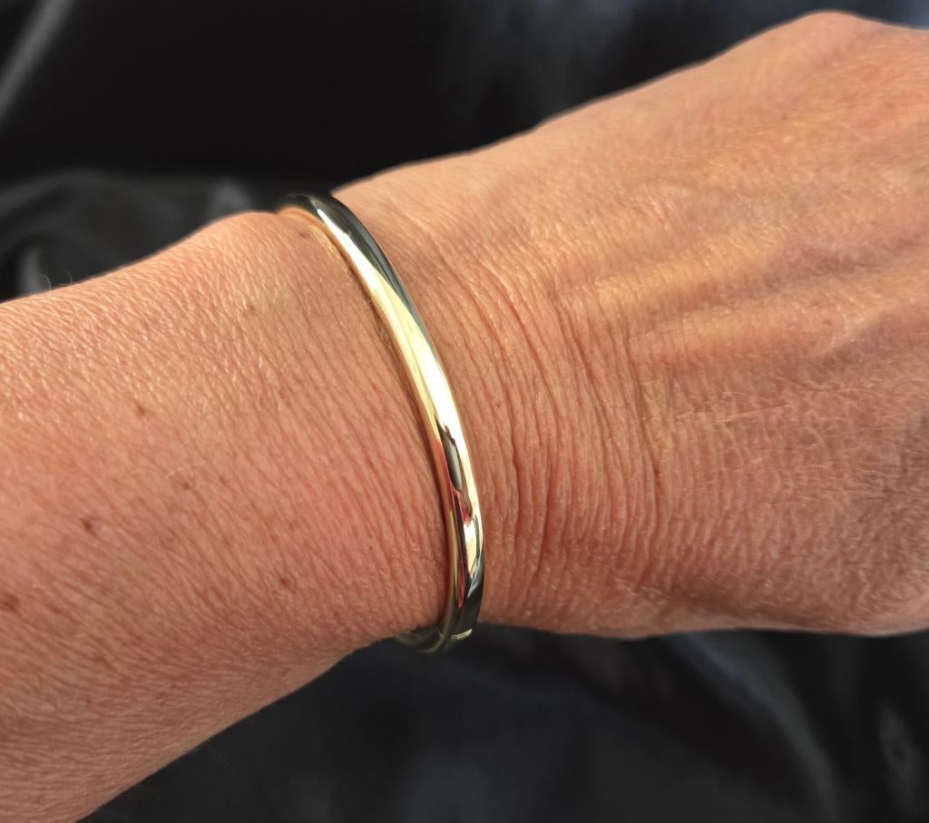 Gouden vintage classic bangle/slavenarmband. 2025/624., Sieraden, Tassen en Uiterlijk, Antieke sieraden, Ophalen of Verzenden