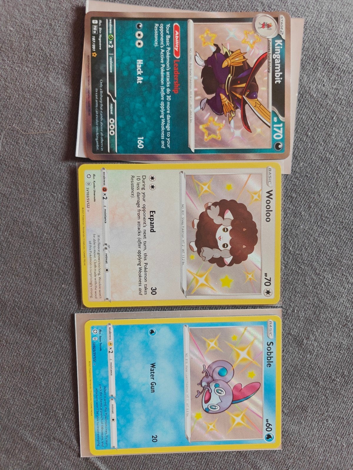 Pokémon Kaarten: Kingambit, Wooloo, Sobble (Shining Fates), Ophalen of Verzenden, Zo goed als nieuw, Meerdere kaarten, Foil