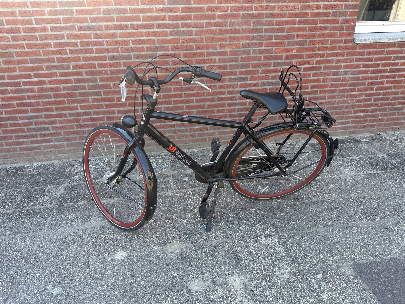 28 inch jongensfiets - Zwart met rode accenten, Overige merken, Gebruikt, Velgrem, Ophalen of Verzenden