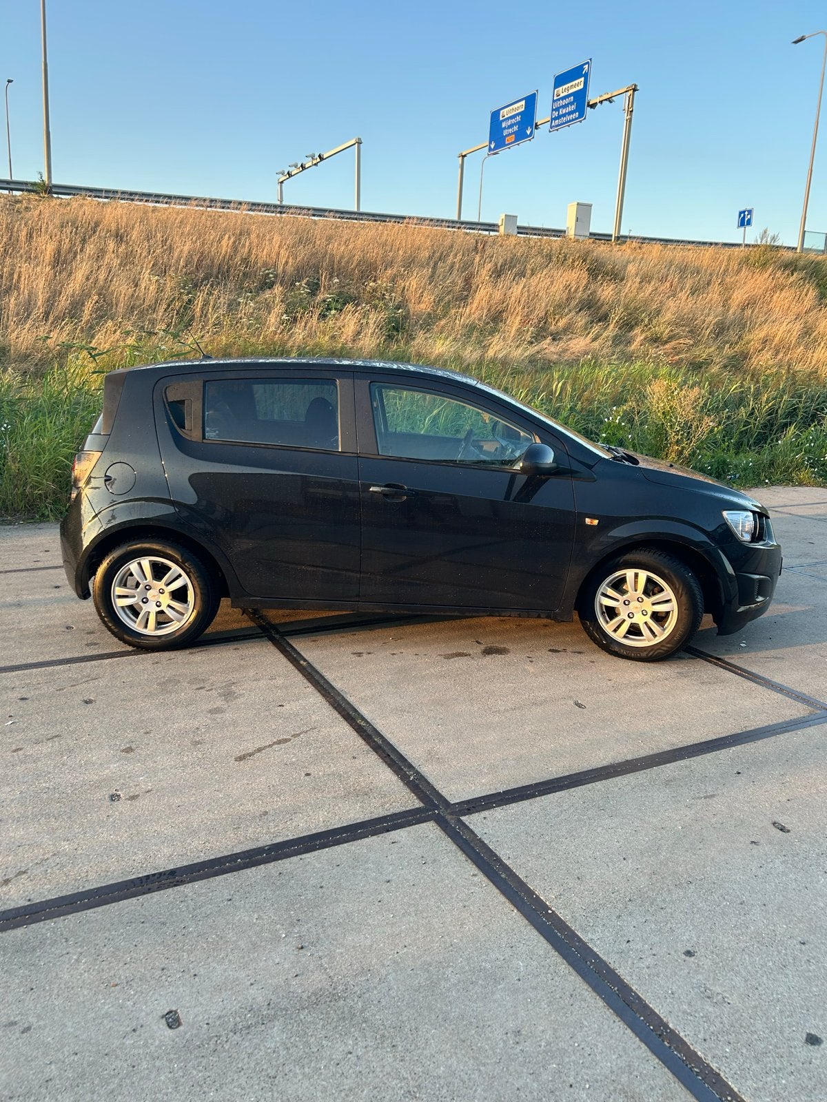 Chevrolet Aveo 1.4 5D 2011 Zwart, Auto's, Voorwielaandrijving, Euro 5, 4 cilinders, Particulier