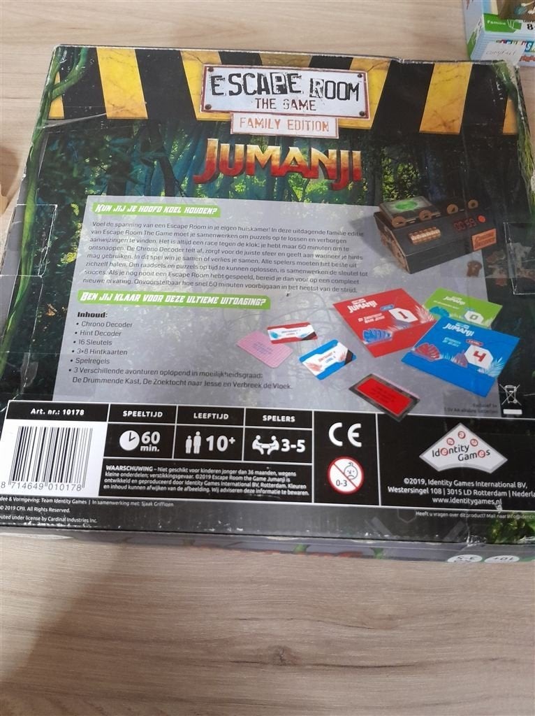 Escape room the game - family editie - jumanji - s3987, Hobby en Vrije tijd, Gezelschapsspellen | Bordspellen, Verzenden, Zo goed als nieuw