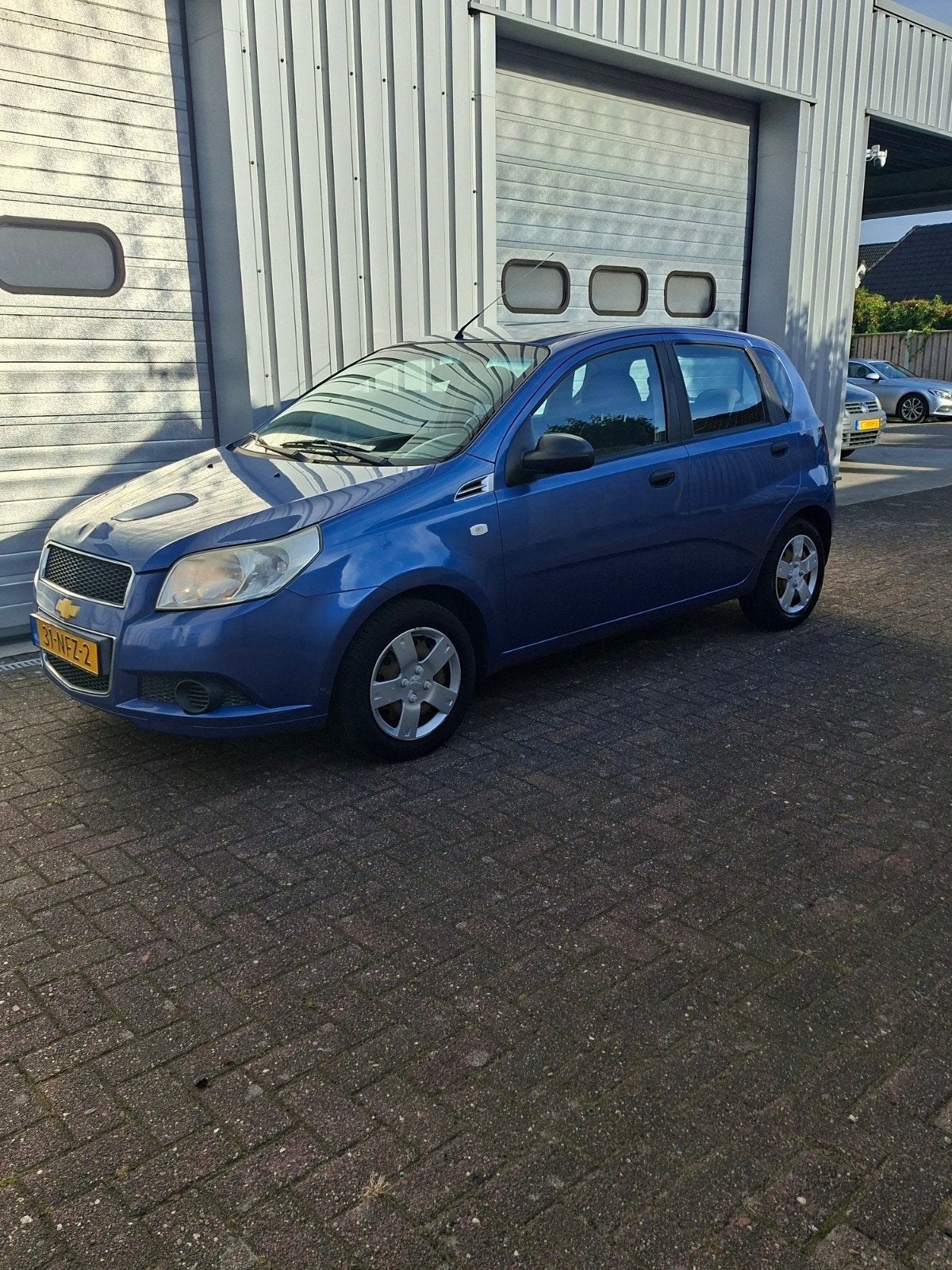 Chevrolet Aveo 1.2 16V 5D 2010 Blauw, Auto's, Voorwielaandrijving, Stof, 40 €/maand, 4 cilinders